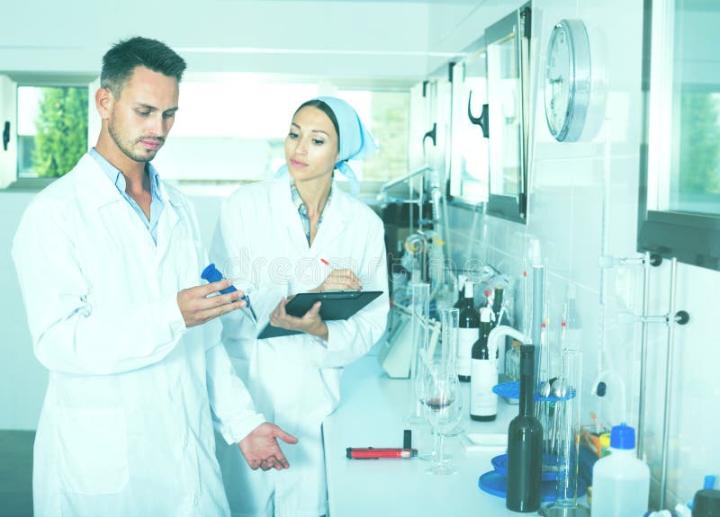 Experts Making Tests in Winery Laboratory Stock Photo Image of