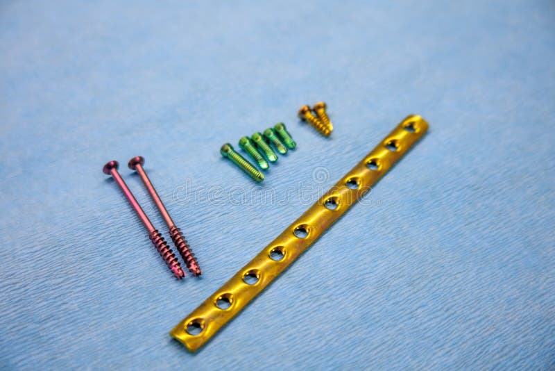Explanted Titanium Surgical Tube Plate and Titanium Screws of