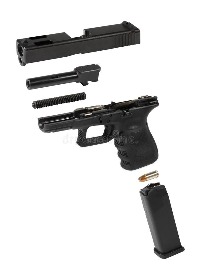 Exploded view of an automatic pistol over a white background. Exploded view of an automatic pistol over a white background.