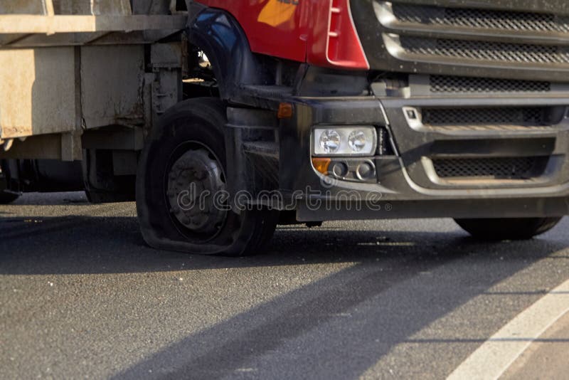 An Exploding Truck Wheel Caused an Accident on the Road Stock Photo Image of repair