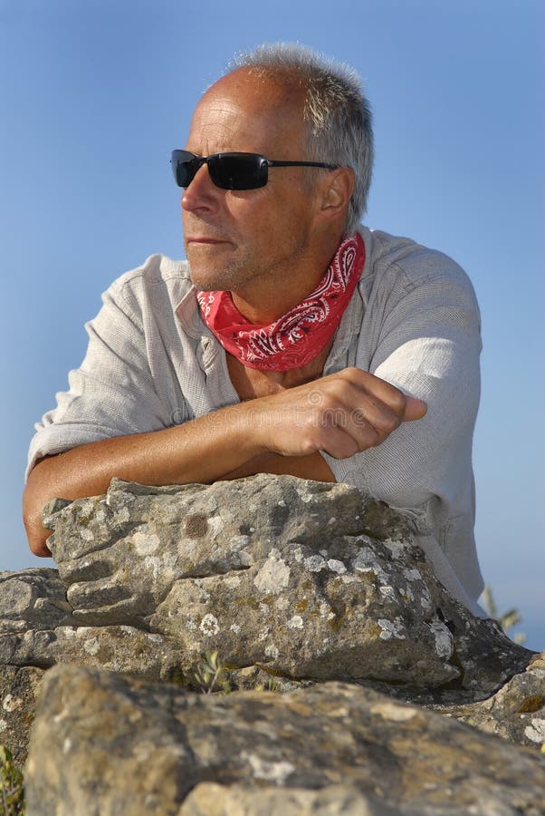 Handsome mature man model posing outdoors. Adventurer adventure stock images, royalty-free photos and pictures