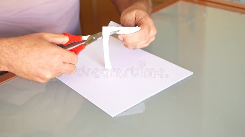 Exploring Creative Paper Cutting Techniques with Scissors for Unique Art Projects and Crafting stock footage