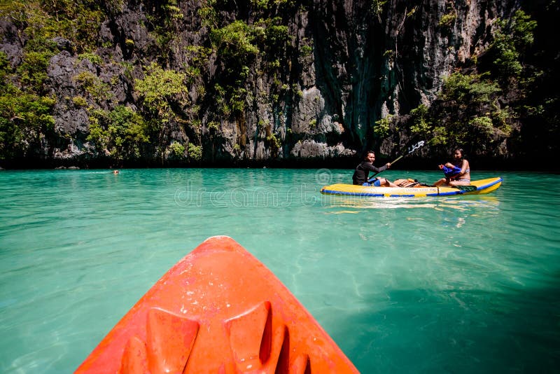 Exploring the Small Lagoon of El Nido in Kayak Editorial Stock Image