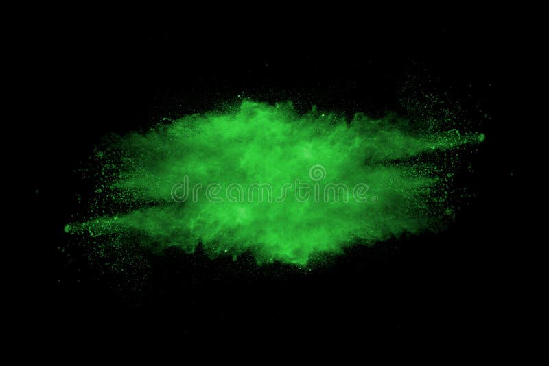 Green Color Powder Explosion Cloud On Black Background.Green Dust