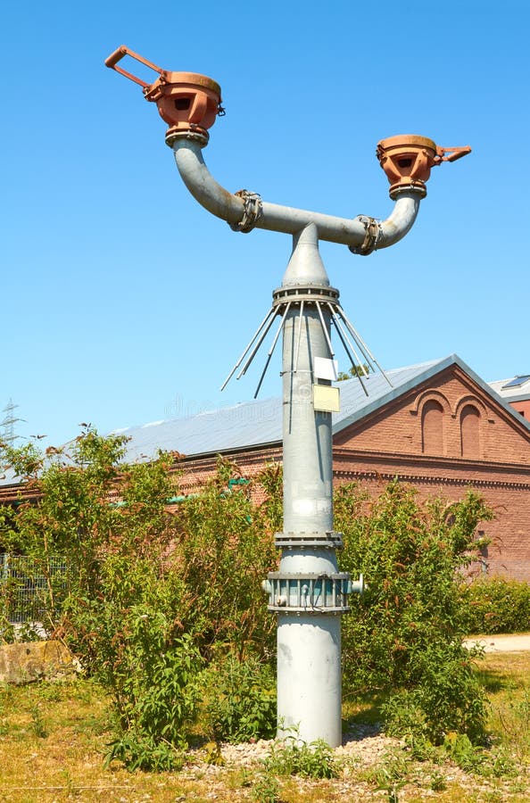 Gas is released from a former mine via the degassing line under the protector hoods. Flame arrester stock images, royalty-free photos and pictures