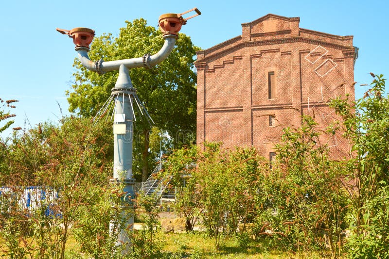 Gas is released from a former mine via the degassing line under the protector hoods. Flame arrester stock images, royalty-free photos and pictures
