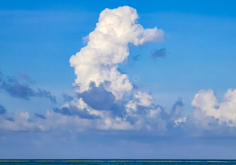 Explosive cloud formation cumulus clouds in the sky in Mexico stock photo