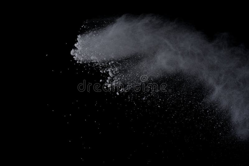 White powder explosion on black background. Dust splatted isolated. Paint Holi. White powder explosion on black background. Dust splatted isolated. Paint Holi.