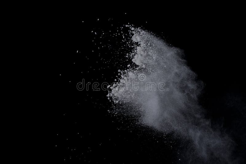 White powder explosion on black background. Dust splatted isolated. Paint Holi. White powder explosion on black background. Dust splatted isolated. Paint Holi.