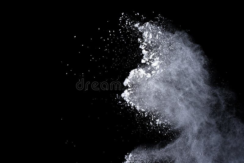 White powder explosion on black background. Dust splatted isolated. Paint Holi. White powder explosion on black background. Dust splatted isolated. Paint Holi.