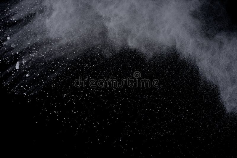 White powder explosion on black background. Dust splatted isolated. Paint Holi. White powder explosion on black background. Dust splatted isolated. Paint Holi.