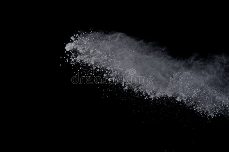 White powder explosion on black background. Dust splatted isolated. Paint Holi. White powder explosion on black background. Dust splatted isolated. Paint Holi.