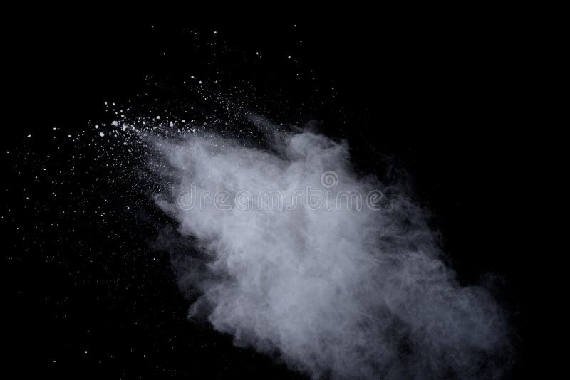 White powder explosion on black background. Dust splatted isolated. Paint Holi. White powder explosion on black background. Dust splatted isolated. Paint Holi
