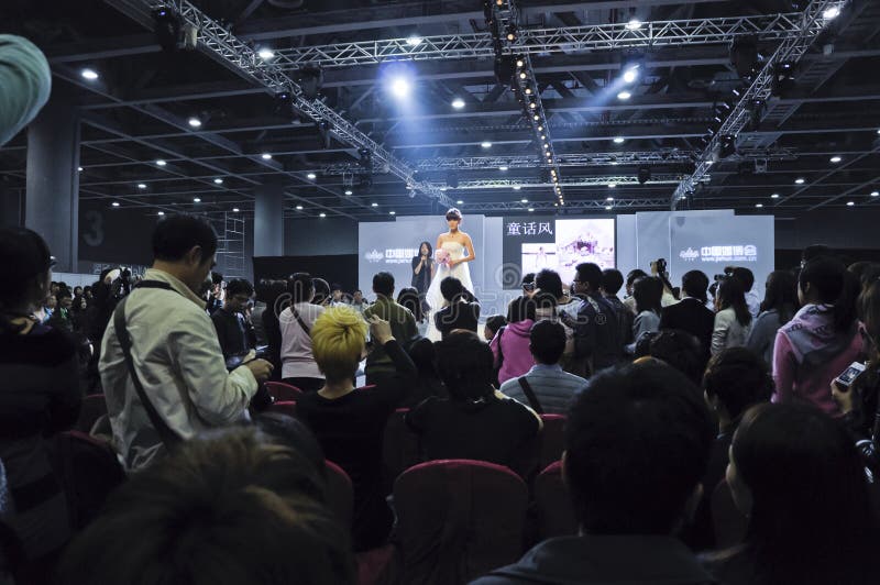 Chinese model display wedding dress in Spring 2011 China (Guangzhou) Wedding Expo，show time from March 12 to 13, Poly World Trade Center Complex located in Pazhou of Guangzhou. Chinese model display wedding dress in Spring 2011 China (Guangzhou) Wedding Expo，show time from March 12 to 13, Poly World Trade Center Complex located in Pazhou of Guangzhou.