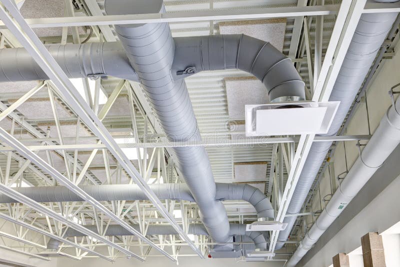 Exposed HVAC duct work in a modern elementary school.