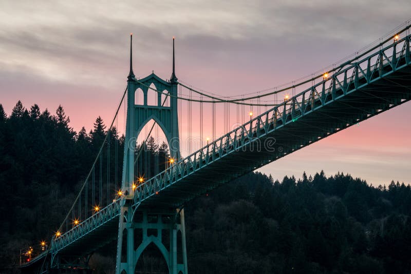 A long exposure photo of the St Johns Bridge in Portland Oregon at sunset. A long exposure photo of the St Johns Bridge in Portland Oregon at sunset.