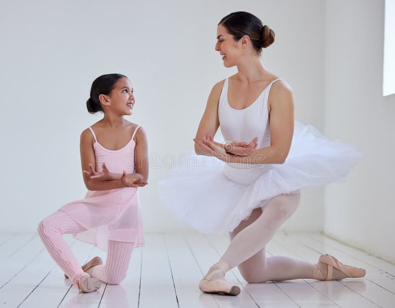 Expressing Herself through Ballet. a Little Girl Practicing Ballet with Her Teacher in a Dance