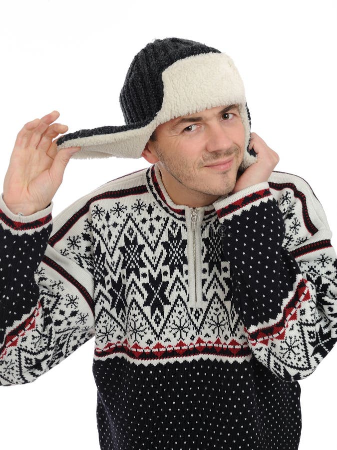 Expressions.Funny winter man in warm hat listening