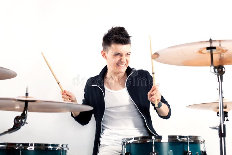 Expressive Young Drummer Playing at the Drums with Drum Stick Stock Image Image of playing
