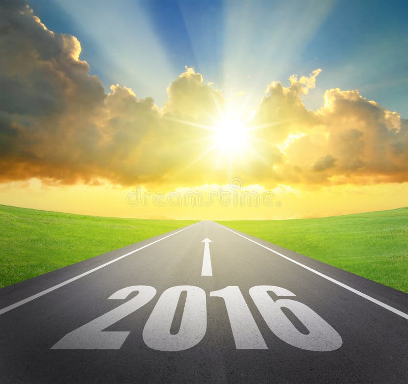 Forward to 2016 new year concept , asphalt road with arrow , date and beautiful sunset and sunshine. Forward to 2016 new year concept , asphalt road with arrow , date and beautiful sunset and sunshine