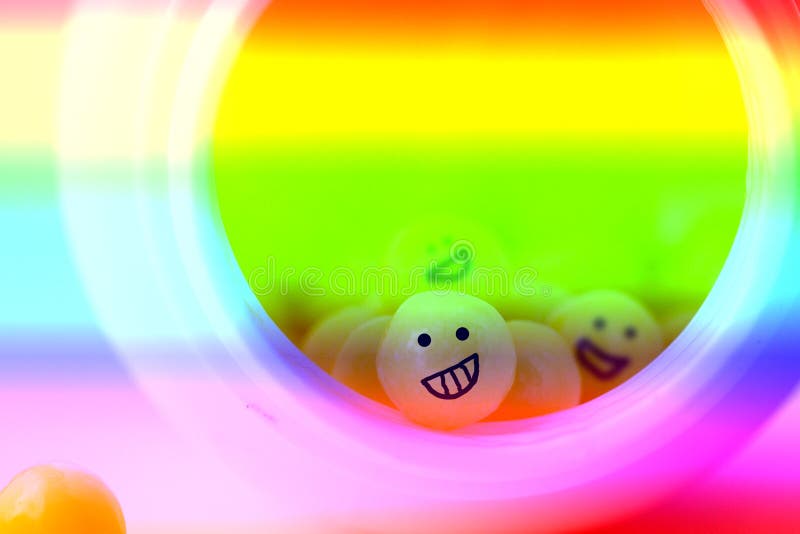 Extasy pills with crasy smiles. Colorful toned image