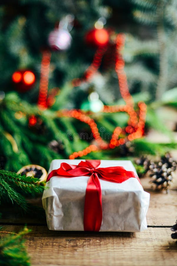 Extensive series of holiday shots with a variety of props and backgrounds. Lots of copyspace for ads. Christmas presents on wooden stock photo Extensive series of holiday shots with a variety of props and backgrounds. Lots of copyspace for ads. Christmas presents on wooden stock photo