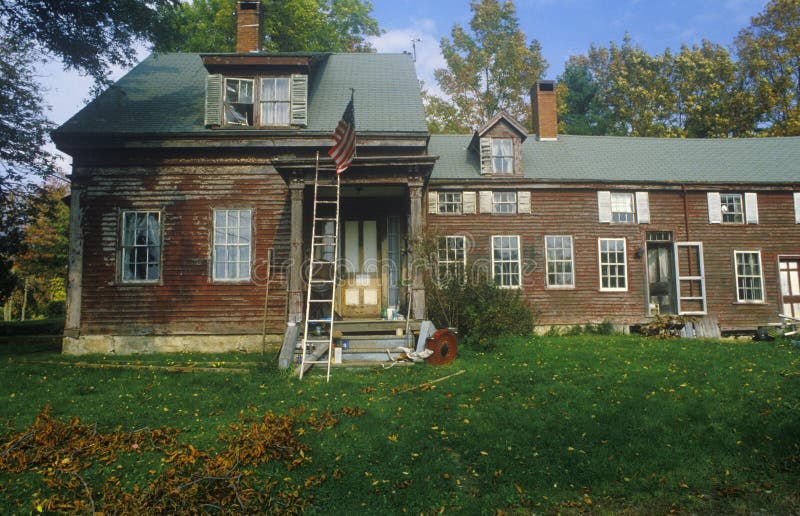 Front exterior of rundown home, New England. Front exterior of rundown home, New England