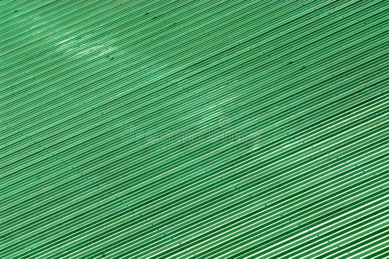 Texture and background of exterior green roof tiles ceramic.