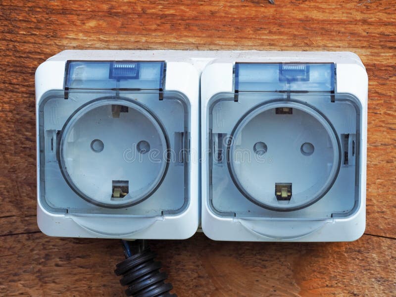 External Electrical Outlet on the Wooden Wall of the House. Stock Image