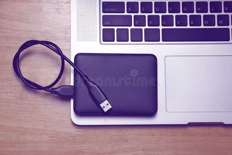 External hard disk and laptop computer stock photo External hard disk and laptop computer stock photo