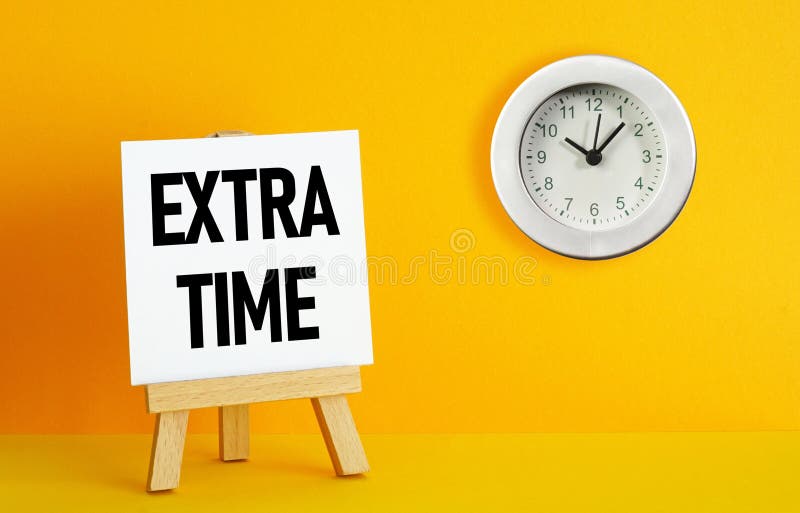 Extra time is shown using the text royalty free stock image