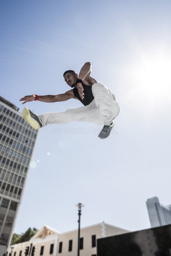 Extreme Athlete Jumping in Front of Building Stock Image Image of