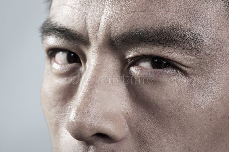 Extreme Close up on angry mans face royalty free stock photo