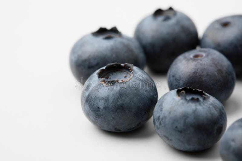 An extreme close-up of fresh blueberries. stock images
