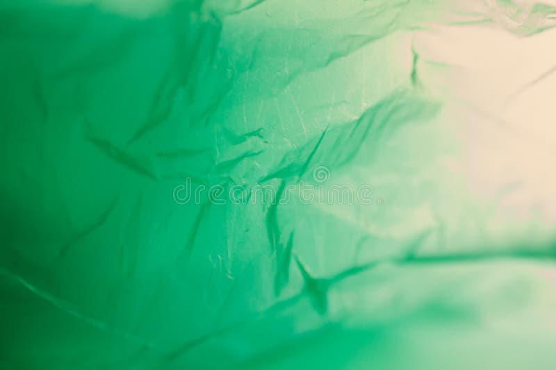 Extreme close up of green empty plastic bag background stock image