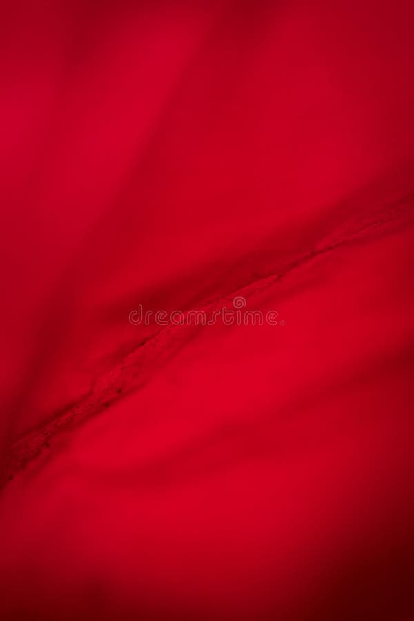 Extreme close up of red empty plastic bag background stock photography