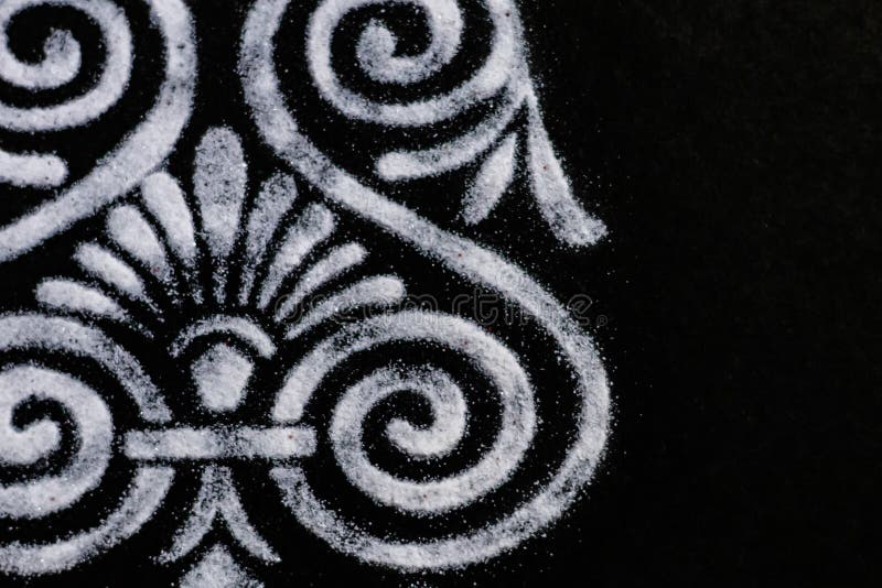 Extreme cropped close up of beautiful detailed rangoli on black background.diwali concept stock photos Extreme cropped close up of beautiful detailed rangoli on black background.diwali concept stock photos