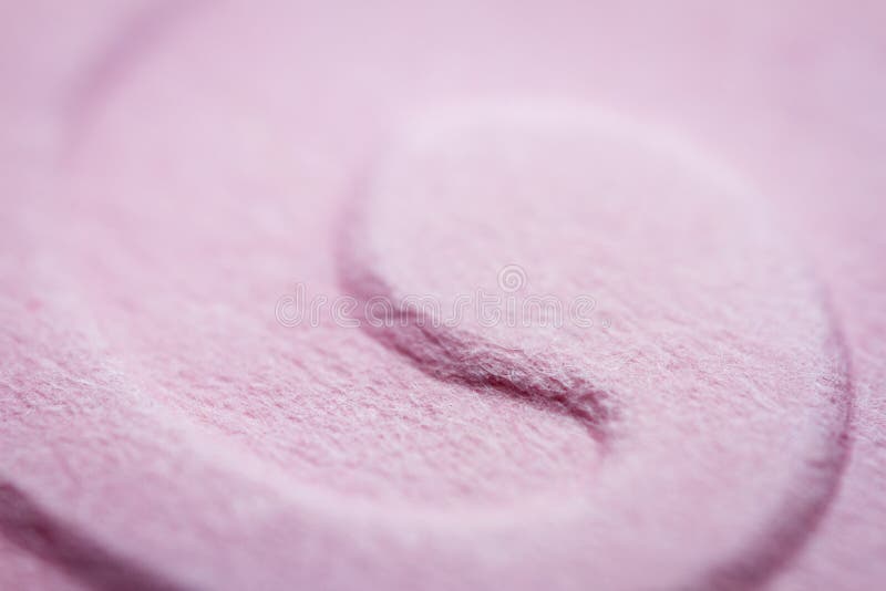 Extreme macro of embossed pink paper royalty free stock photo