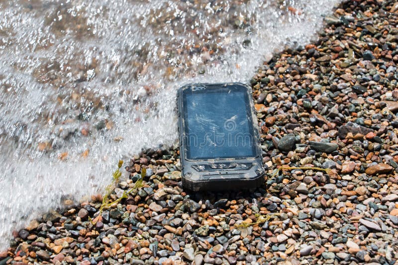 Extreme phone stock image. Image of water, cellphone 43666143