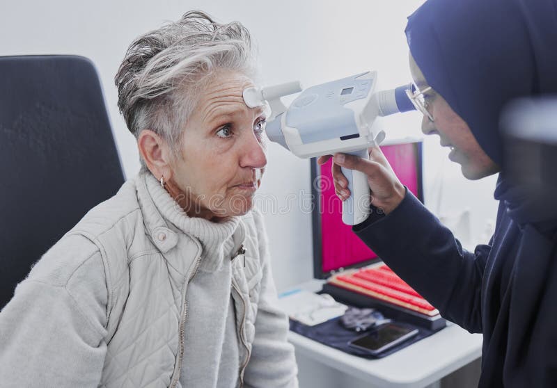 Eye Exam Vision And Senior Woman With Optometrist In Clinic For Eyes