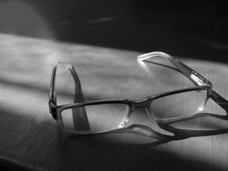 An Eye Glasses for Older Person on Wood Table with Sunlight, As ...
