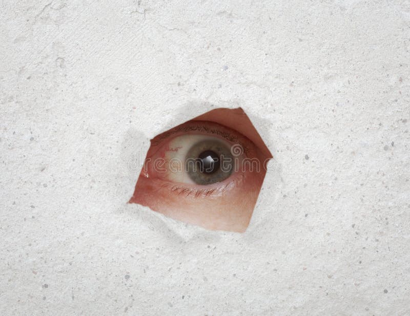 Eye Looking through Hole in Gray Wall Stock Image Image of concrete