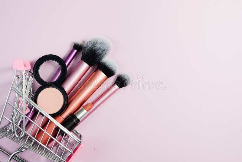 Eye Shadow Blush, Lipstick and Makeup Brushes in a Pink Trolley of the Buyer. the Concept of Online Shopping Decorative Co Stock Photo - Image of blush: 176945780