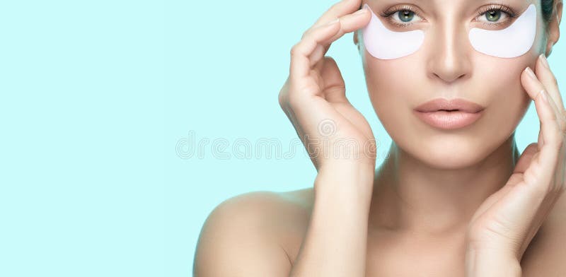 Eye therapy patch. Healthy skin woman with perfect clean skin using under eye patches stock image Eye therapy patch. Healthy skin woman with perfect clean skin using under eye patches stock image