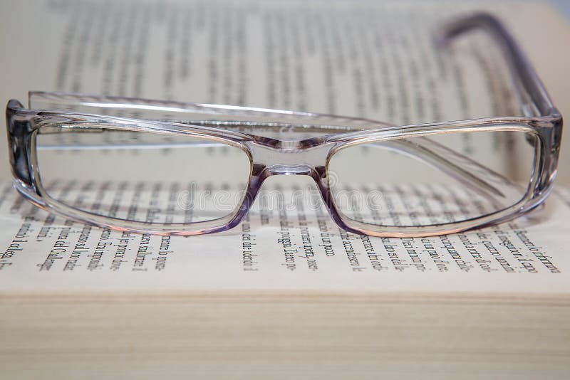 Eyeglasses with book stock image. Image of glasses, myopia 51964057