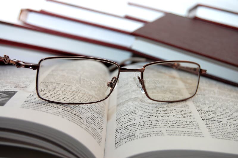 Eyeglasses on books