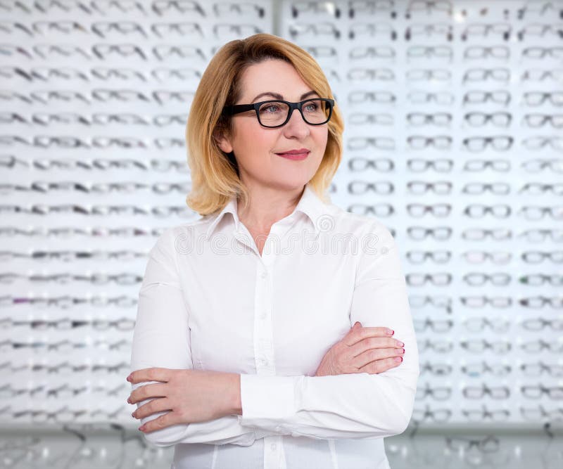Eyesight And Vision Concept Mature Woman Trying New Glasses At