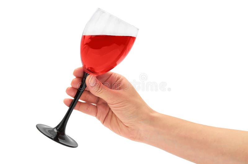 Żeńska ręka trzyma czerwone wino w szkle pojedynczy białe tło zdjęcia stock Żeńska ręka trzyma czerwone wino w szkle pojedynczy białe tło zdjęcia stock