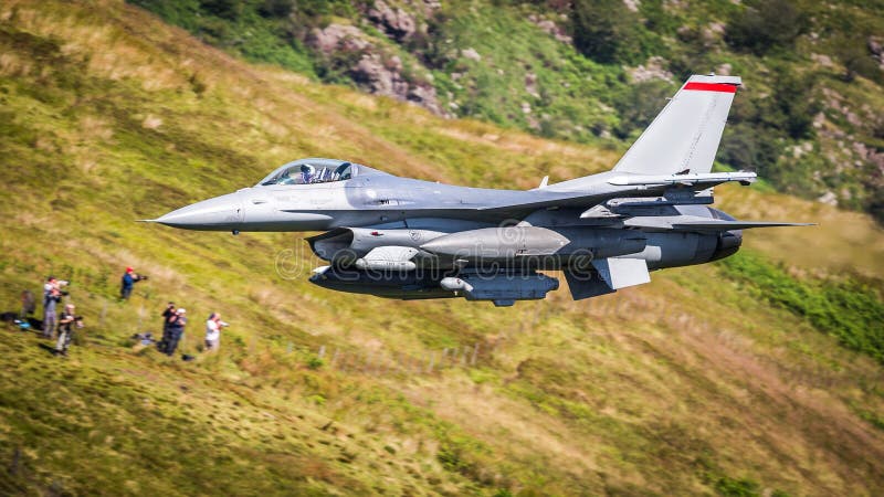 USAF F16 military fighter jet aircraft in flight at apx 600 mph. USAF F16 military fighter jet aircraft in flight at apx 600 mph.