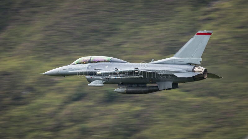 USAF F16 military fighter jet aircraft in flight at apx 600 mph. USAF F16 military fighter jet aircraft in flight at apx 600 mph.